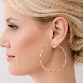 Gold hoops on a blond model