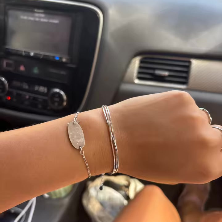 Cute bracelet on girl in car