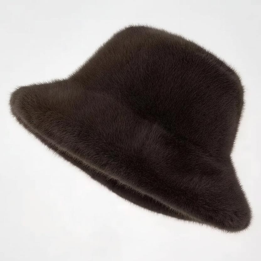 Brown fur hat on a black stand against a white background