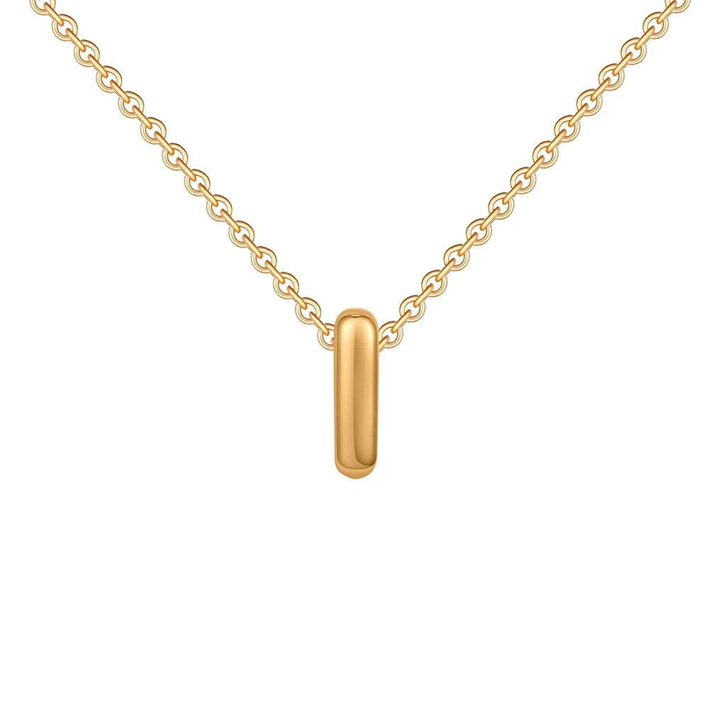 Gold necklace with a cylindrical pendant on a white background
