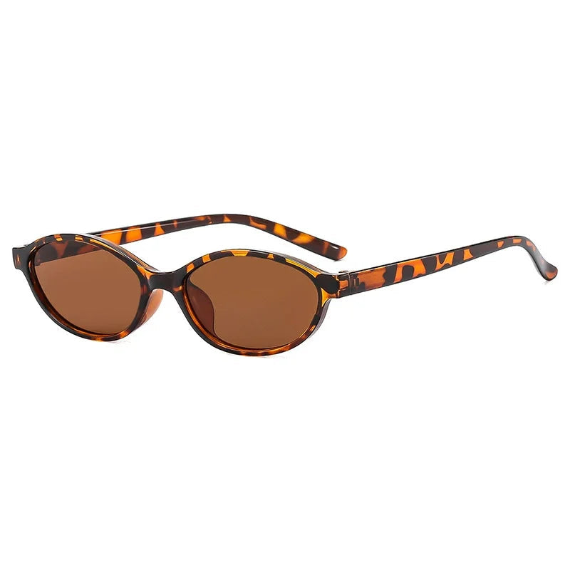 Sunglasses with tortoiseshell frame and brown lenses on a white background
