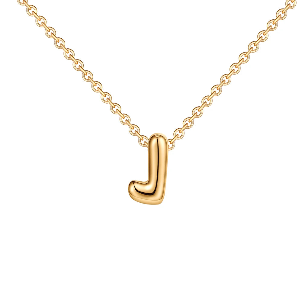 Gold necklace with a 'J' pendant on a white background