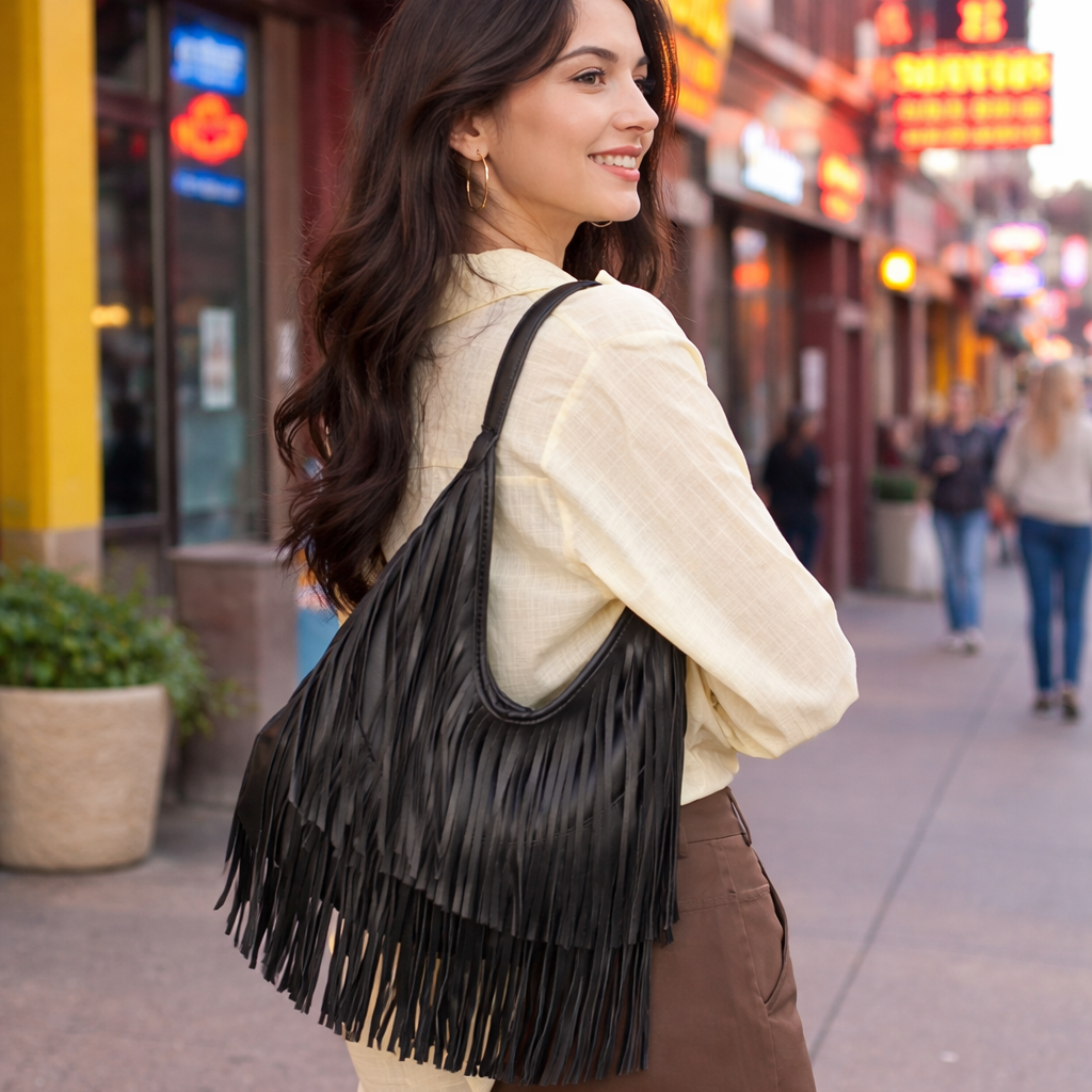 Black ruffle bag on a model walking in the city. 