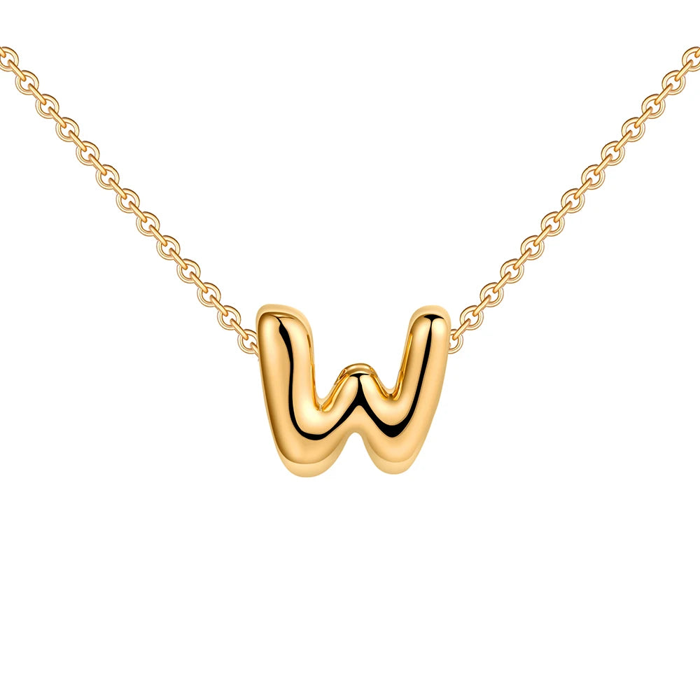 Gold necklace with a 'W' pendant on a white background
