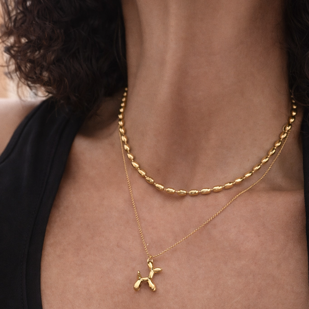 Balloon Necklace on a brown haired lady