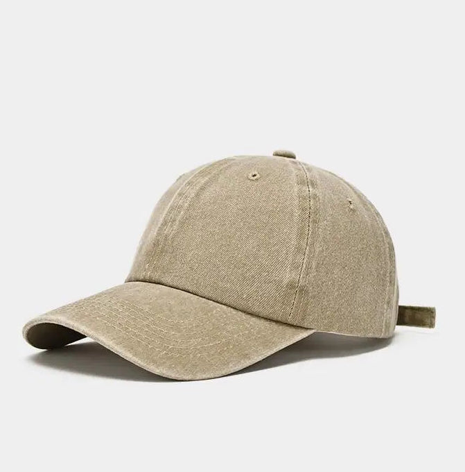 Beige baseball cap on a white background