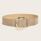 Beige belt with a gold buckle on a light beige background