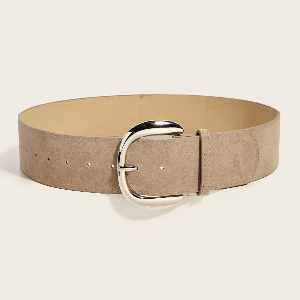 Beige belt with a silver buckle on a light beige background