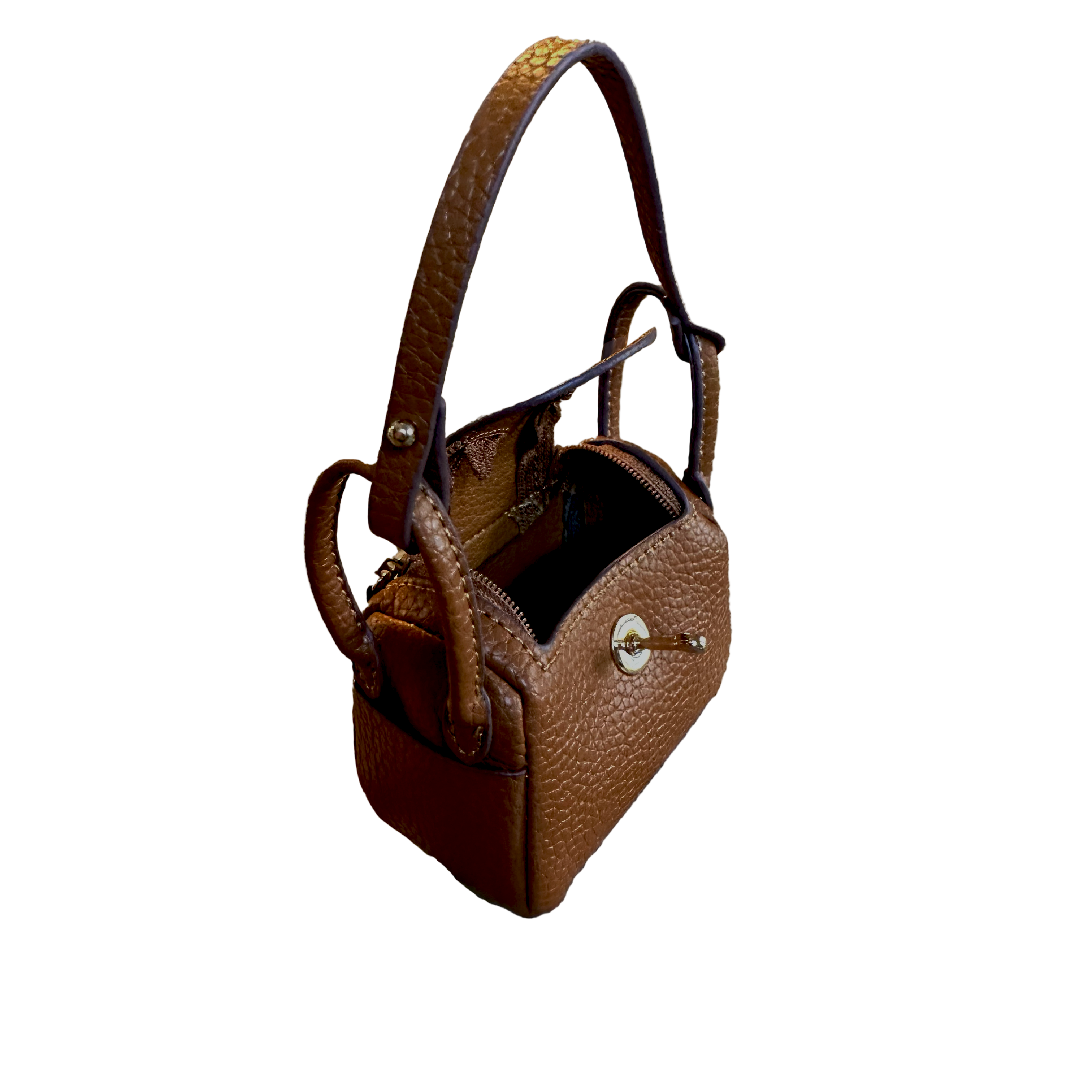 Brown leather mini handbag with a textured handle on a light gray background