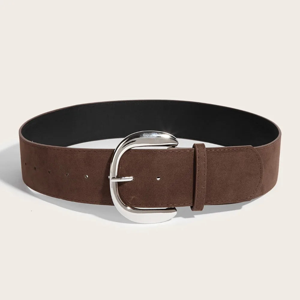 Brown belt with a silver buckle on a beige background