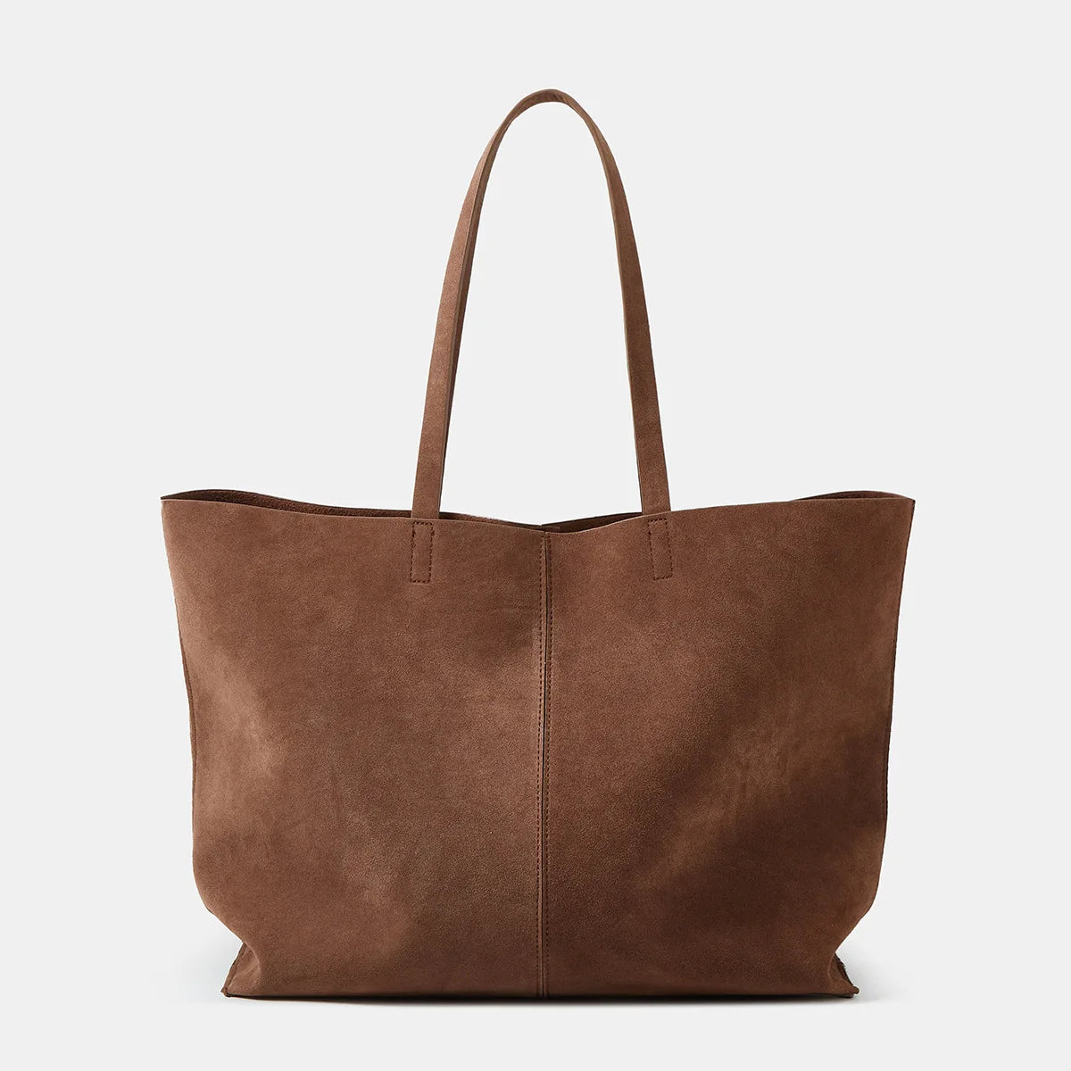 Brown leather tote bag on a light gray background