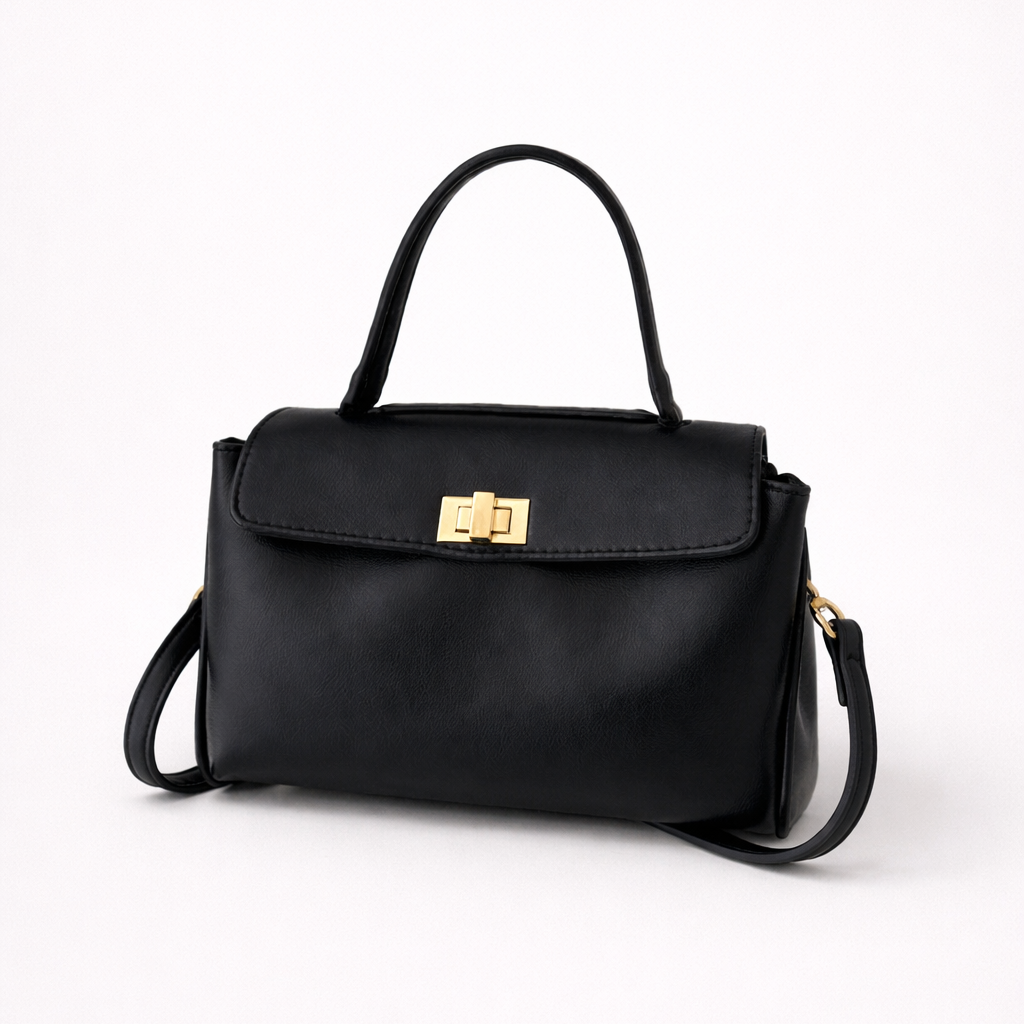 Black handbag with a gold clasp on a white background