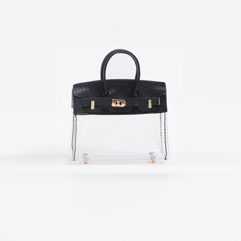 Black top handle and base, clear panel structured mini bag charm with gold-tone hardware.