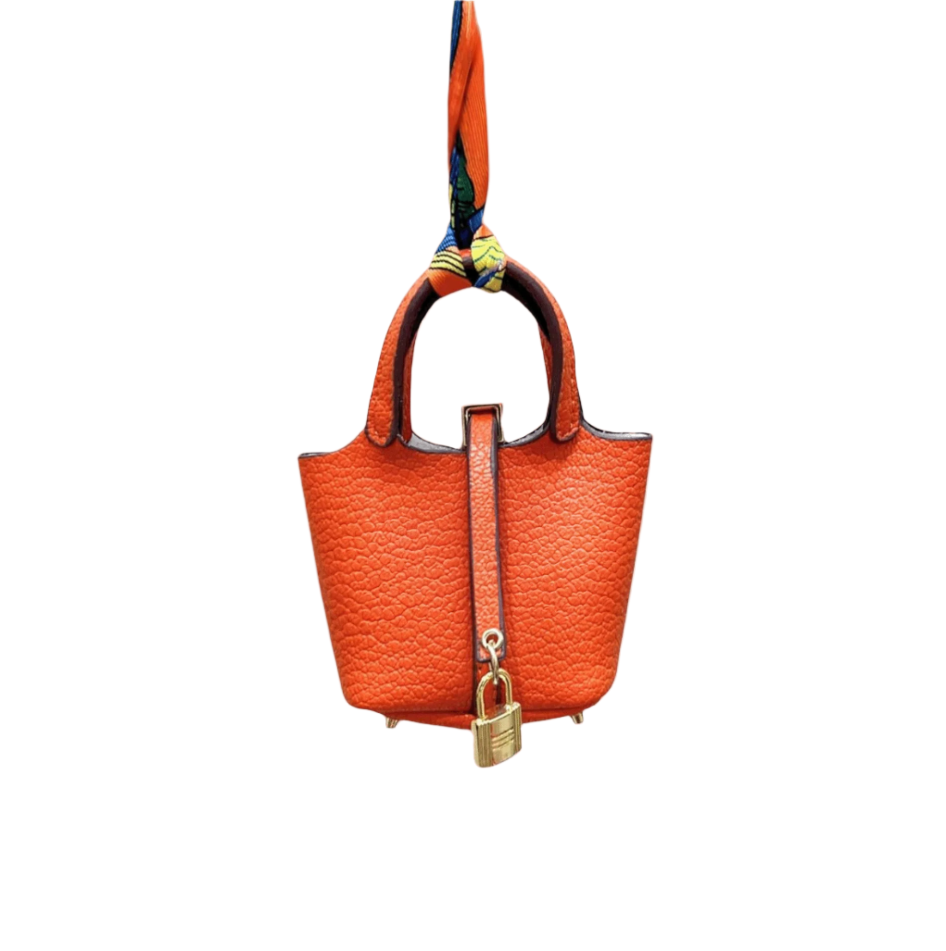Orange leather mini bucket bag charm with gold padlock detail, structured sides, and open-top storage functionality.