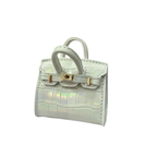White genuine leather structured charm with glossy, iridescent (pearl) crocodile embossed texture and top handle.
