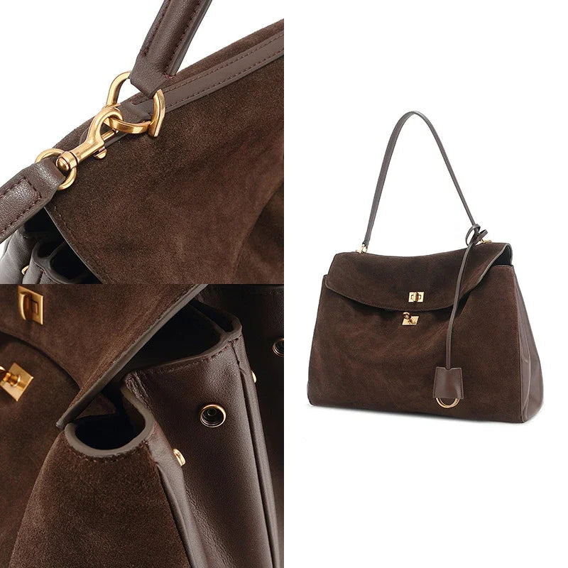 Brown handbag with gold hardware on a white background