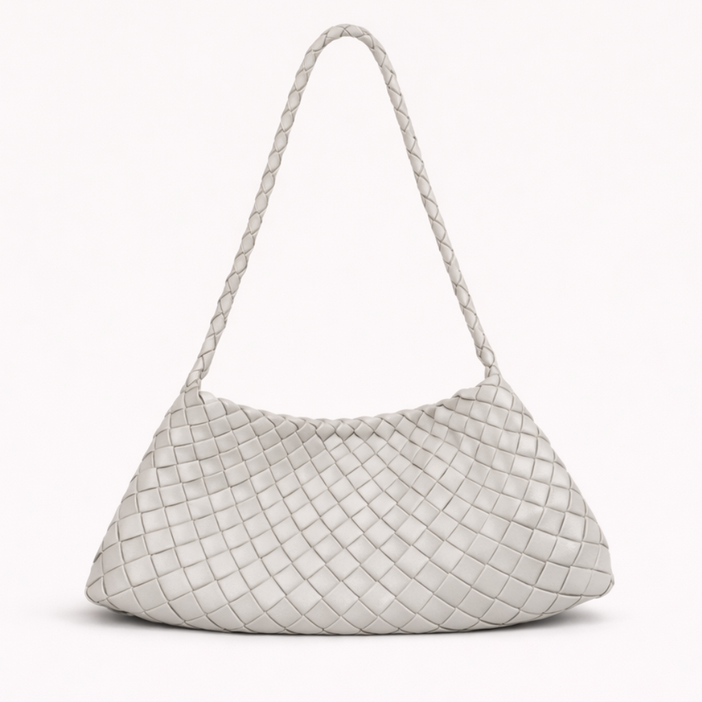 White woven handbag on a white background
