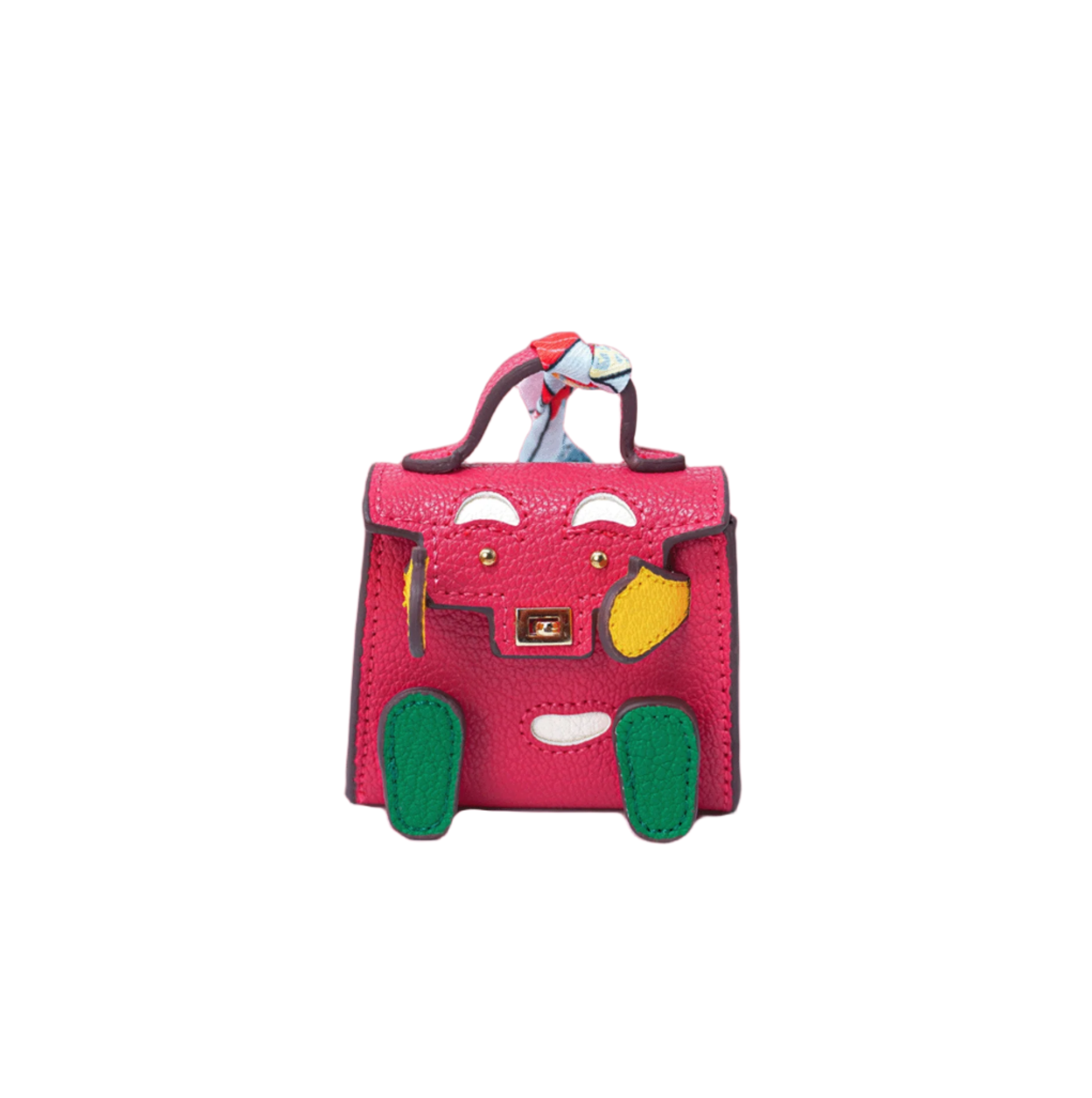 Red/Magenta mini leather bag charm with a playful face design made of green, yellow, and white patches.