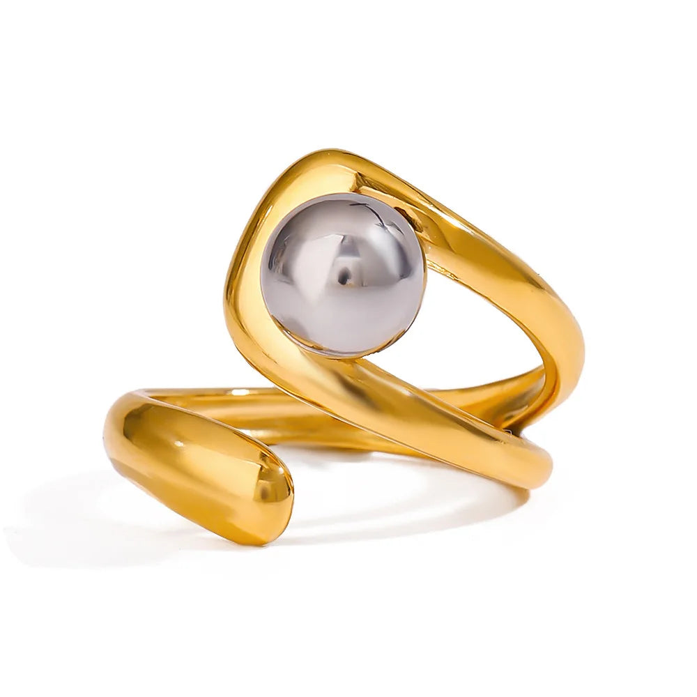 Gold and silver ring on a white background