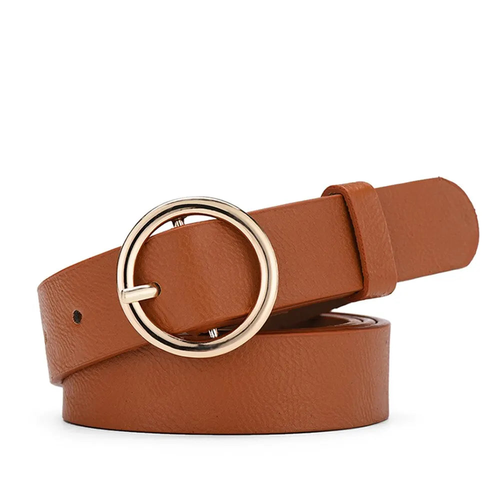 Brown belt with a gold ring buckle on a white background