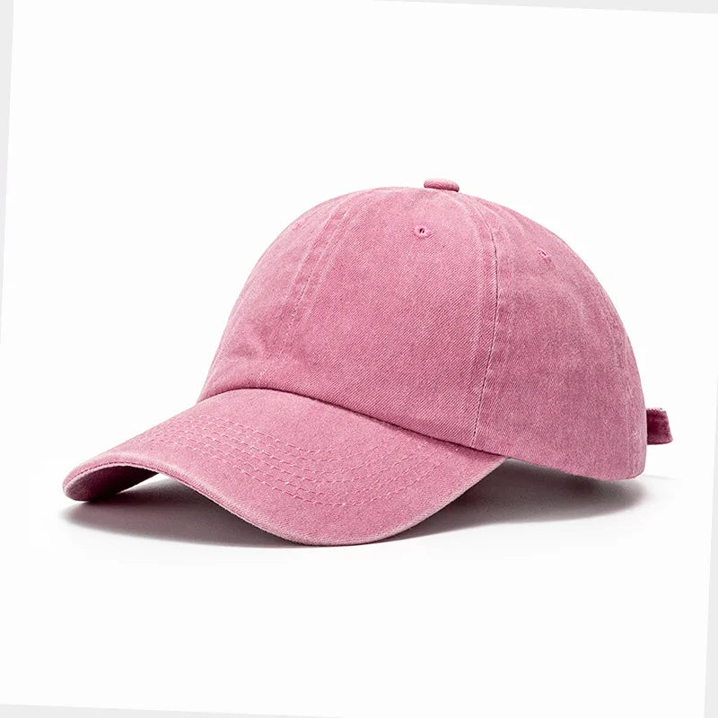 Pink baseball cap on a white background