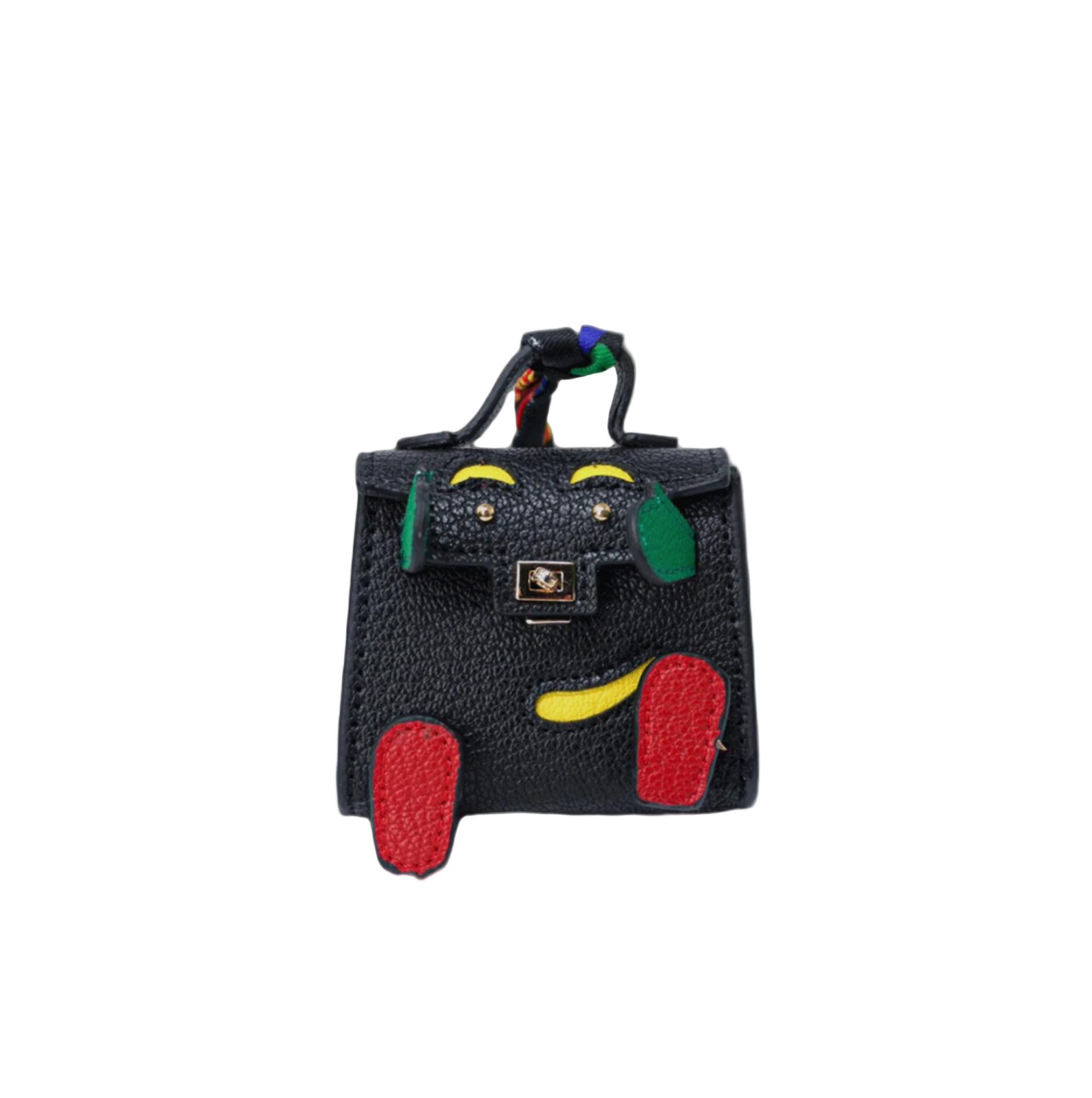 Black mini leather bag charm with a playful face design made of red, yellow, and green patches.