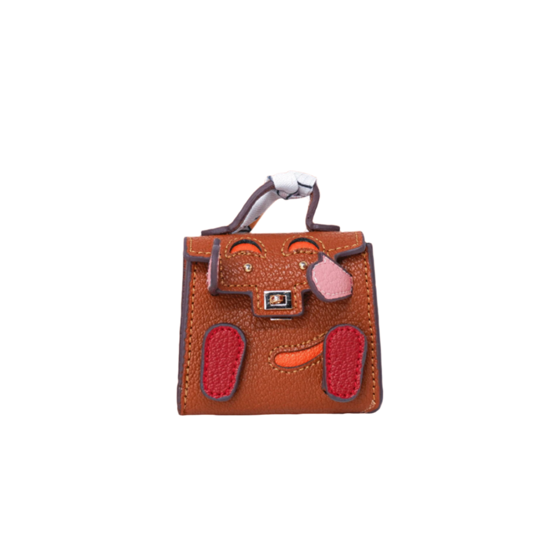 Brown mini leather bag charm with a playful face design made of red, orange, and pink patches.
