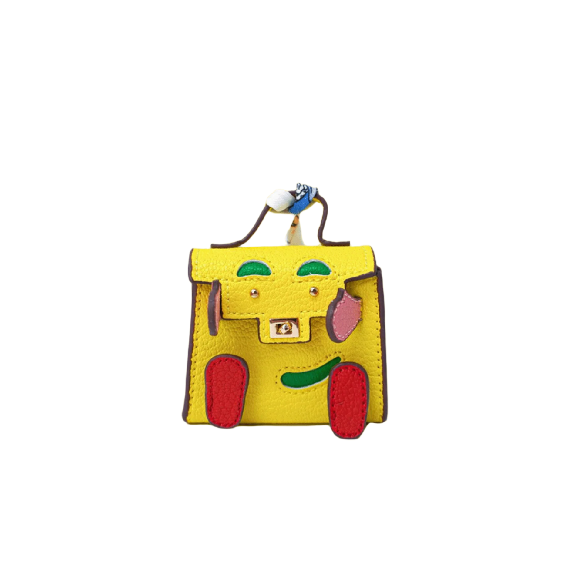 Yellow mini leather bag charm with a playful face design made of red, green, and pink patches.