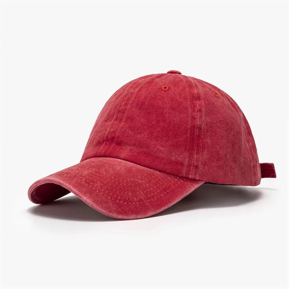 Red baseball cap on a white background