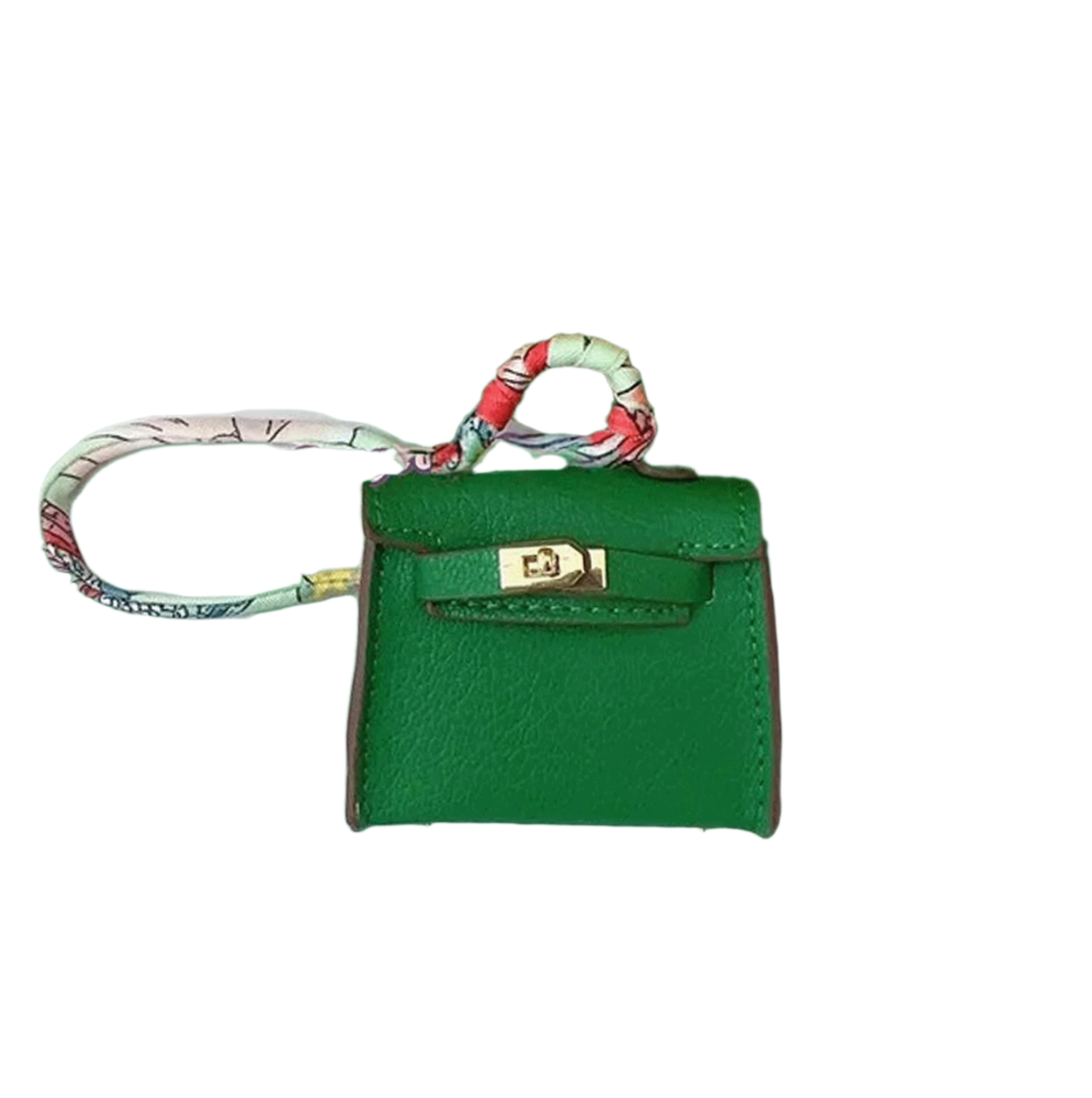 Green leather mini bag charm with scarf-wrapped handle and flap closure. Handbag accessory and keychain.