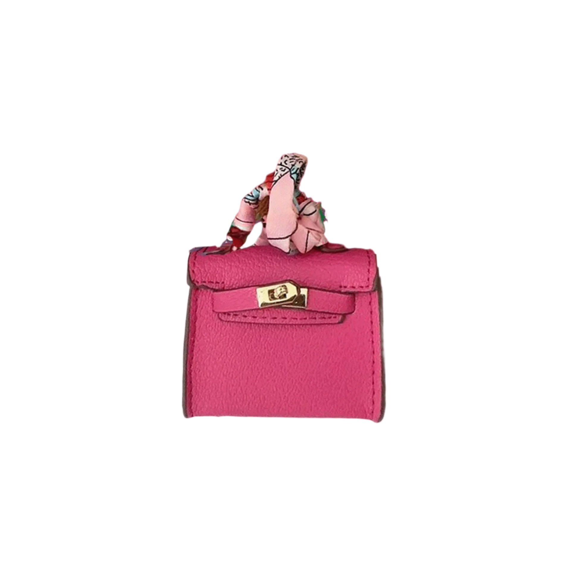 Pink leather mini bag charm with scarf-wrapped handle and flap closure. Handbag accessory and keychain.