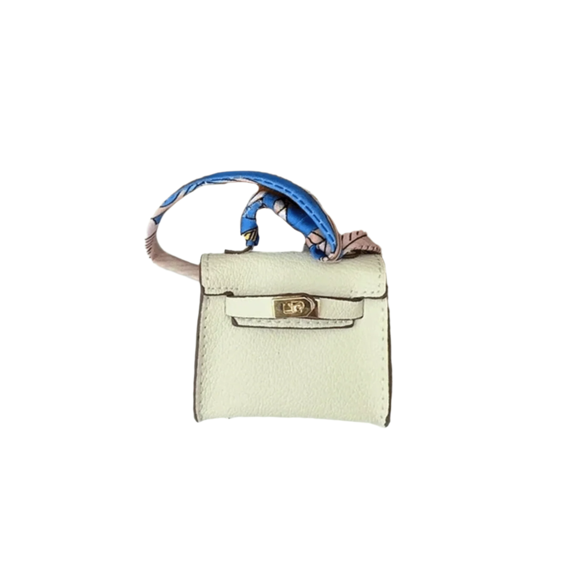 White leather mini bag charm with scarf-wrapped handle and flap closure. Handbag accessory and keychain.