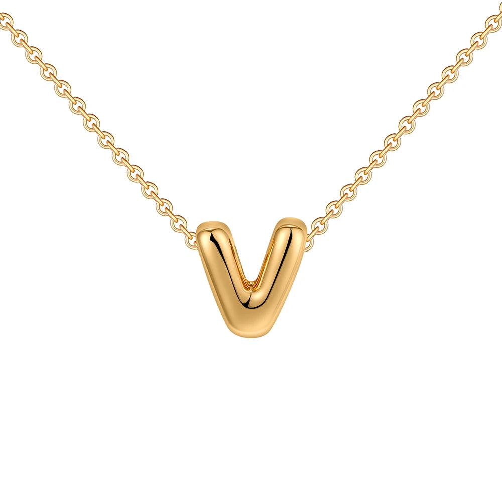 Gold necklace with a 'V' pendant on a white background