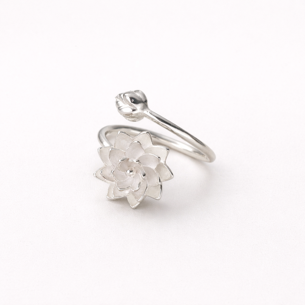 Silver lotus flower ring on a white background