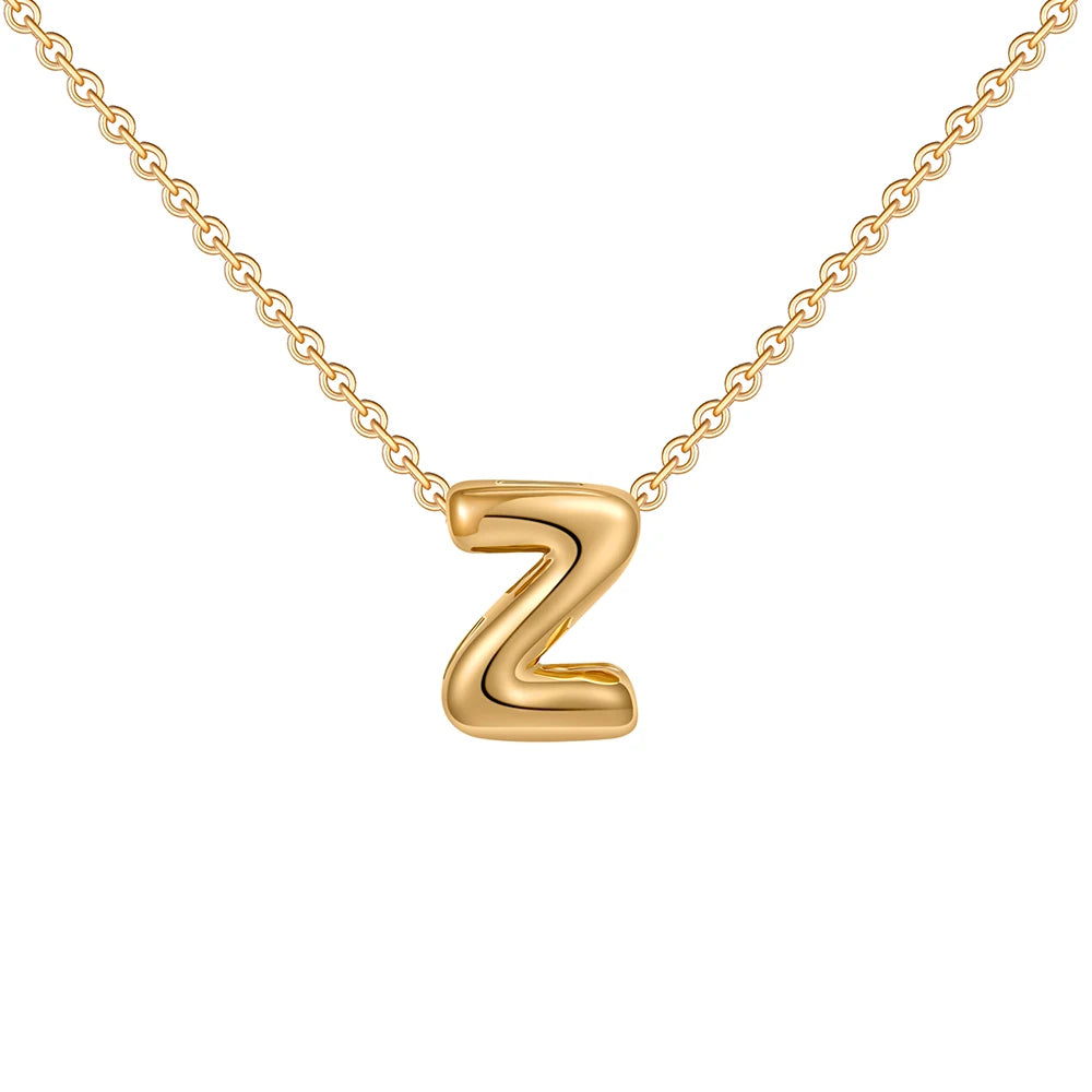 Gold necklace with a 'Z' pendant on a white background